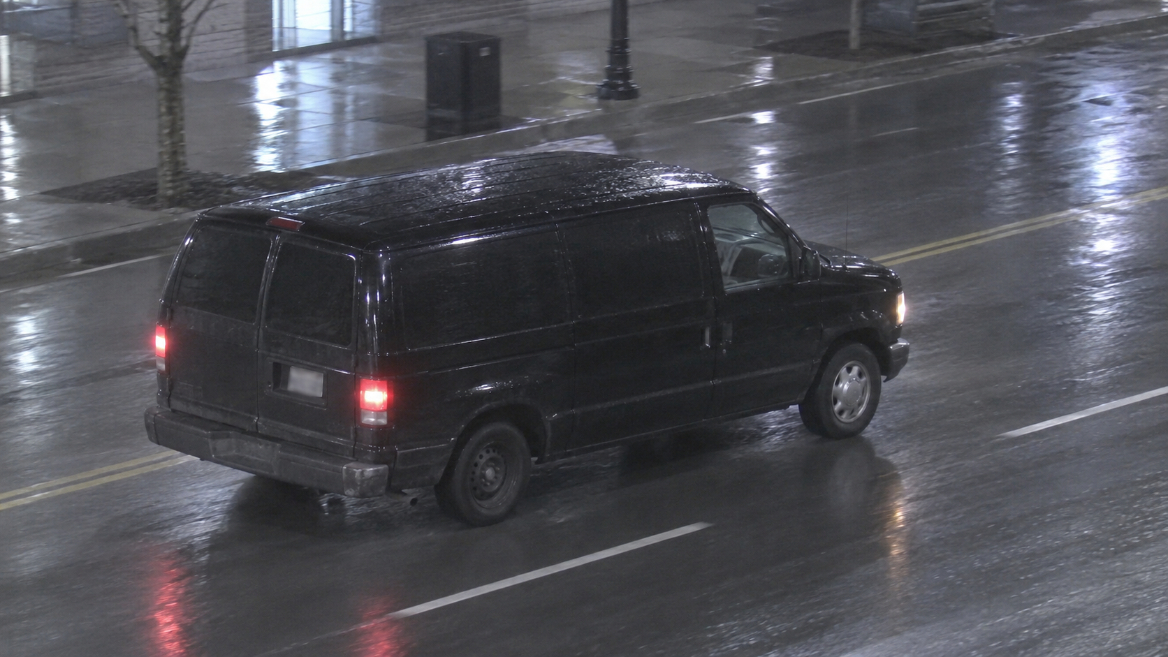 Reference image of the target black van pointing right